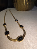 Collier Chaîne Serpent Pierres Noires Dorées