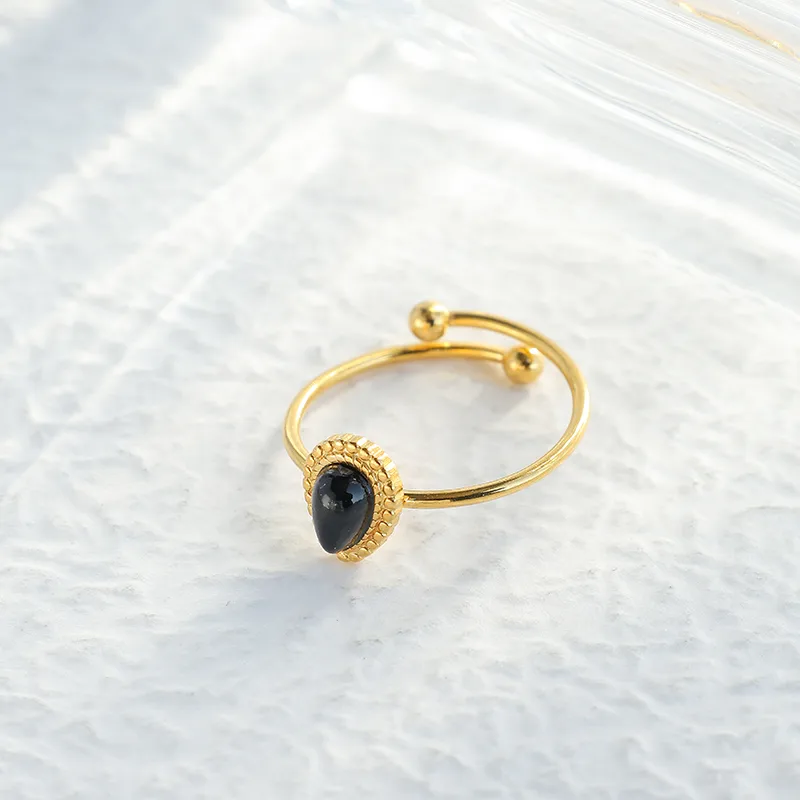 Bague Acier Inoxydable Dorée Pierre Noire Onyx Goutte Contour Perlé Ajustable